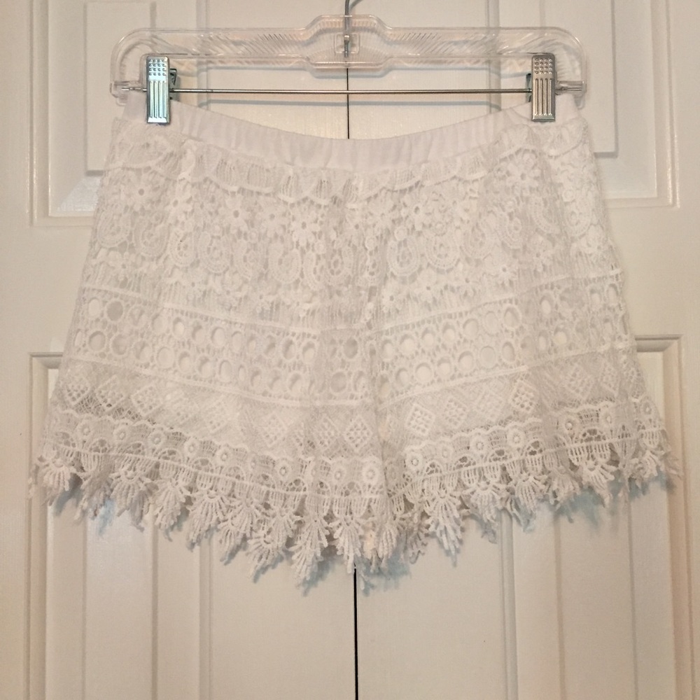 White fringe shorts